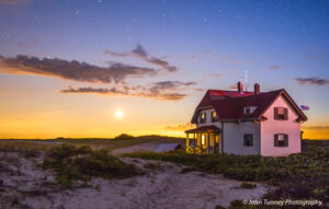 sunset over house at Race Point
