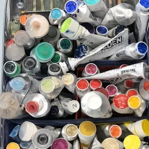 Close-up of artist paint tubes in assorted colors