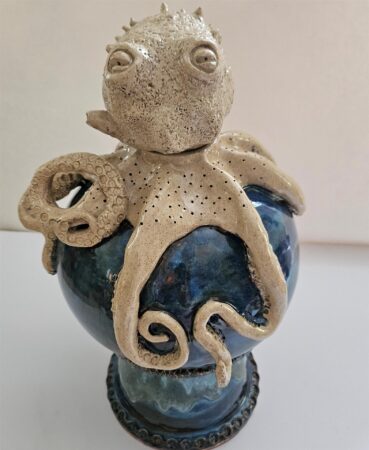 <b>Rhonda Litwinowich</b></br> <i>The Whole World</i> </br>Sculpture: Clay</br>14x9"</br>$800