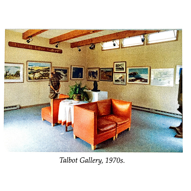 Talbot Gallery interior with artwork and orange chairs