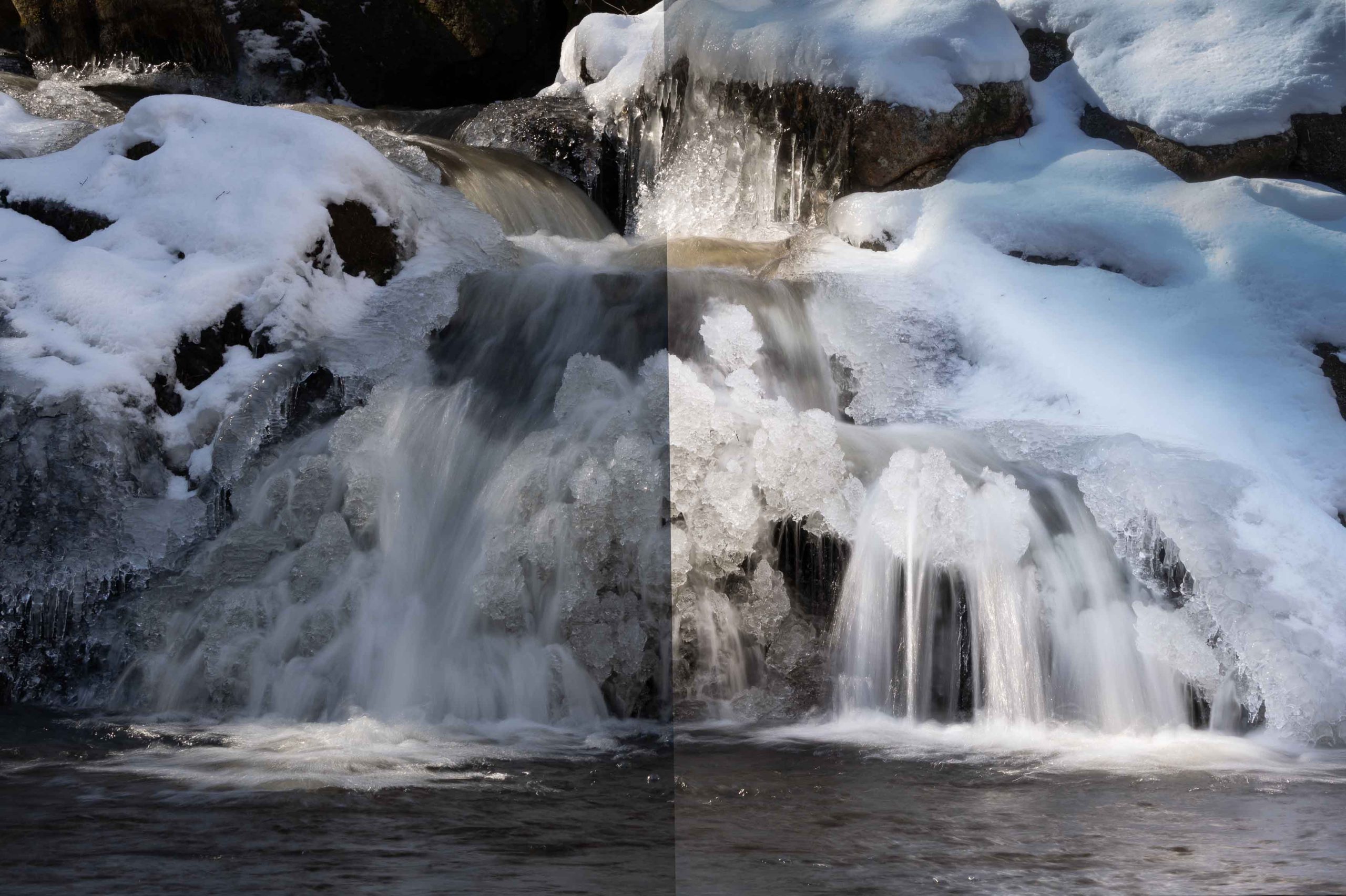Snow-covered waterfall with frozen edges